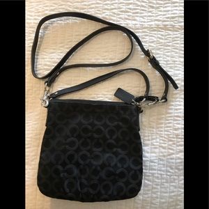Coach signature black crossbody bag.